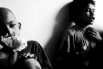 Santos and Raju inhale glue in an alleyway in Kathmandu, Nepal. The continued use of glue effects neurological and are long term. Santos says it helps take away hunger, cold and while hallucinating he sees the Hindu God Ganesh. June 2005. Santos and Raju inhale glue in an alleyway in Kathmandu, Nepal. The continued use of glue effects neurological and are long term. Santos says it helps take away hunger, cold and while hallucinating he sees the Hindu God Ganesh. June 2005.